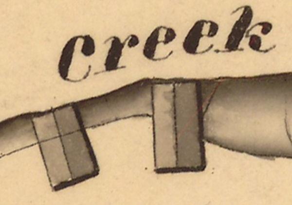 Brush lettering for a creek.